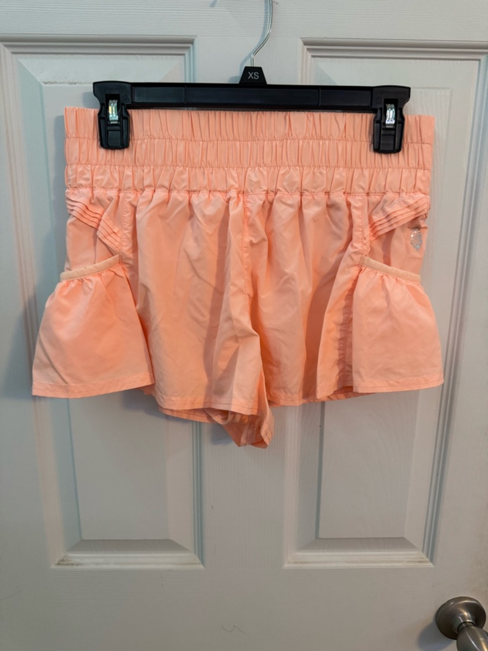 FP Movement peach colored shorts
